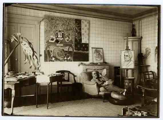 Henri Matisse in his apartment